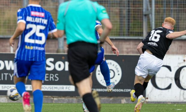 Stenhousemuir's Euan O'Reilly scores against St Johnstone.