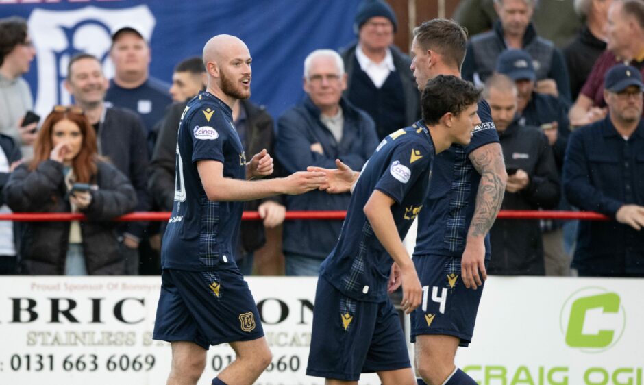 Dundee celebrate the opening goal. Image: SNS