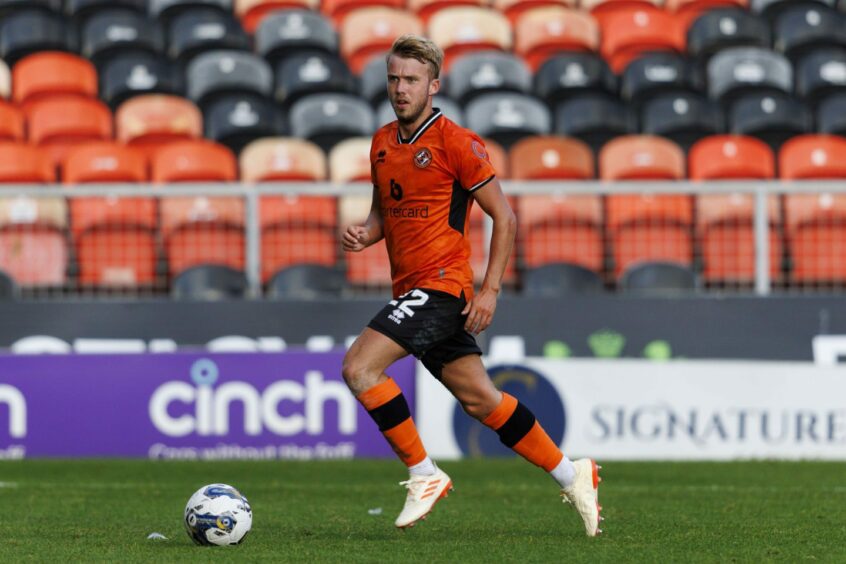 Kieran Freeman in action for Dundee United at Tannadice