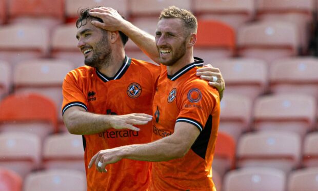 Tony Watt celebrates with Louis Moult at Dundee United FC