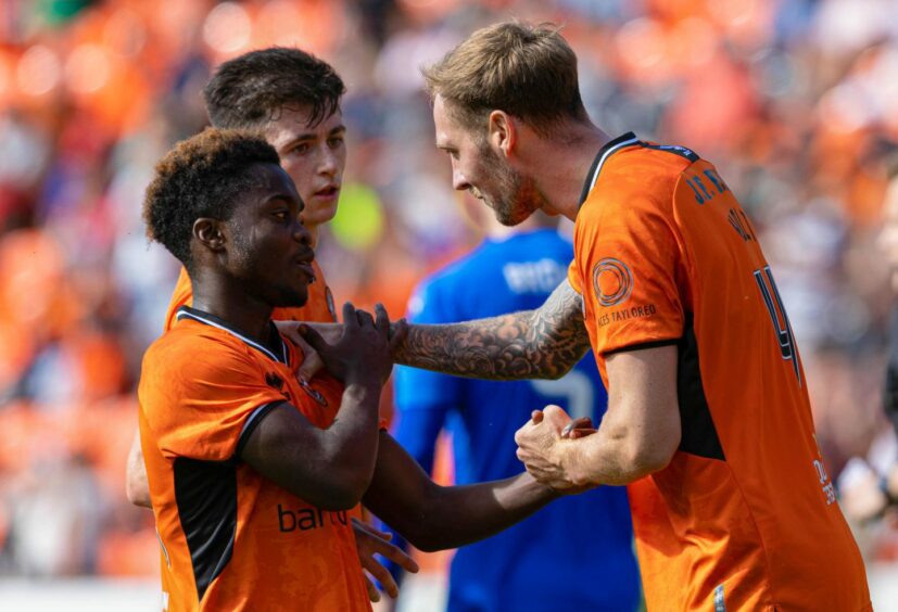Mathew Cudjoe, left, and Kevin Holt after the Dundee United youngster won a penalty against Peterhead