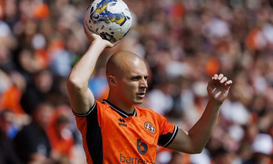 Liam Grimshaw takes a Dundee United throw at Tannadice, Dundee.