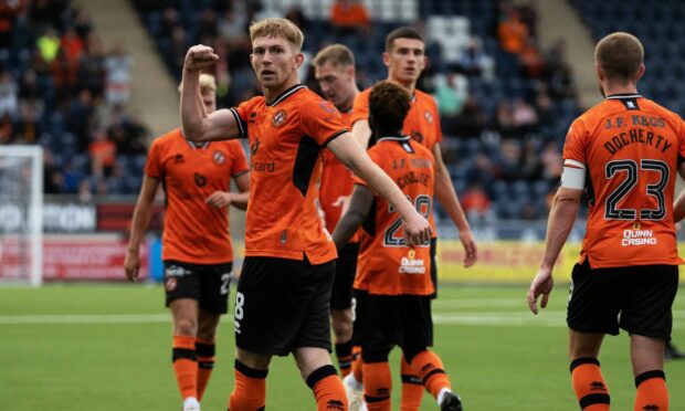 Kai Fotheringham celebrates a goal for Dundee United against Falkirk