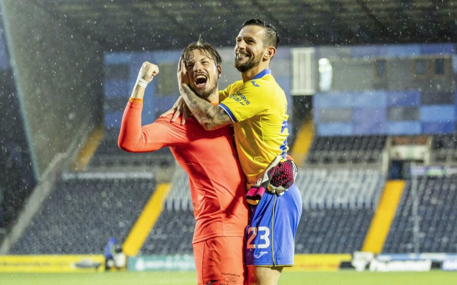 Raith Rovers goalkeeper raises his fist as he is embraced by team-mate Dylan Easton. Image: SNS.
