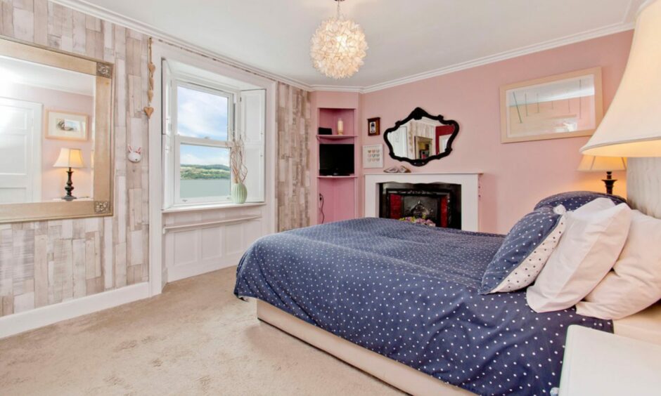 One bedroom in the Broughty Ferry home.