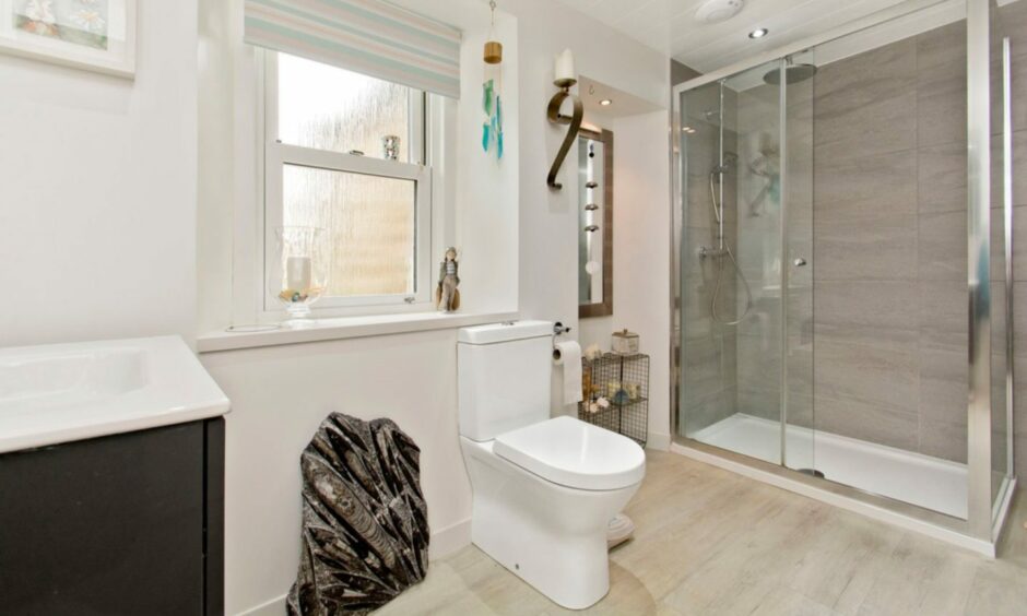 The upstairs shower room in the Broughty Ferry home.
