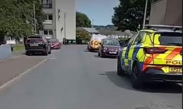 Police in Auchinblae Place in Dundee. Image: Supplied