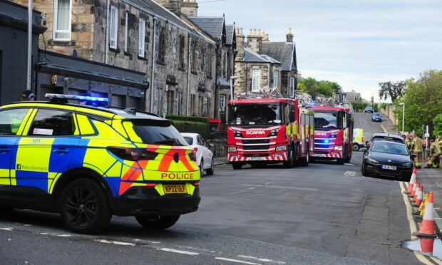 Fire crews and police on the scene at Sang Road in Kirkcaldy.