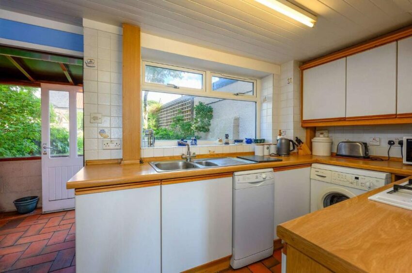 The kitchen at 3 The Terrace, Elie, overlooking the enclosed back garden