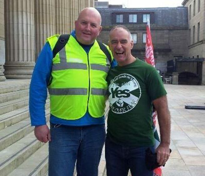 Gareth Norman with Solidarity leader Tommy Sheridan in 2016. 