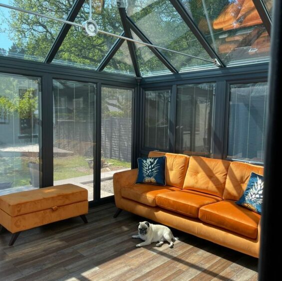 Glass conservatory with a roof replacement in Perth by Highland Homestyle.