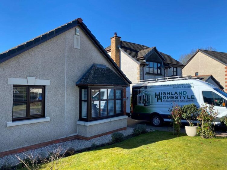 House exterior with a Highland Homestyle van parked in front.