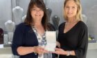 Competition winner Pauline Brown with Jessops Jewellers owner Sophie Jessop and the prize necklace. Image: Jessops Jewellers