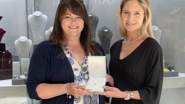 Competition winner Pauline Brown with Jessops Jewellers owner Sophie Jessop and the prize necklace. Image: Jessops Jewellers