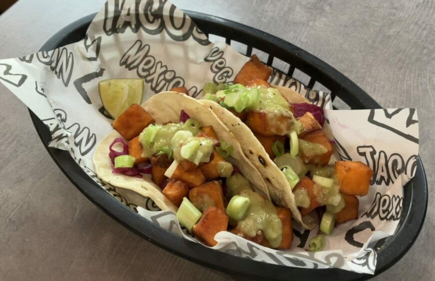 Two sweet potato tacos with salsa verde at Loco Rita's.