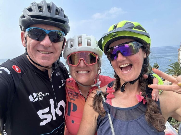 Janet Kerr with her husband Gary and their friend Gillian Sharpe in Spain during the cycling fundraiser for Parkinson's research. 