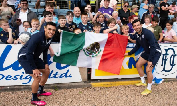 New Dundee signings Diego Pineda (left) and Antonio Portales with young fans at Dens Park. Image: Kim Cessford/DCT