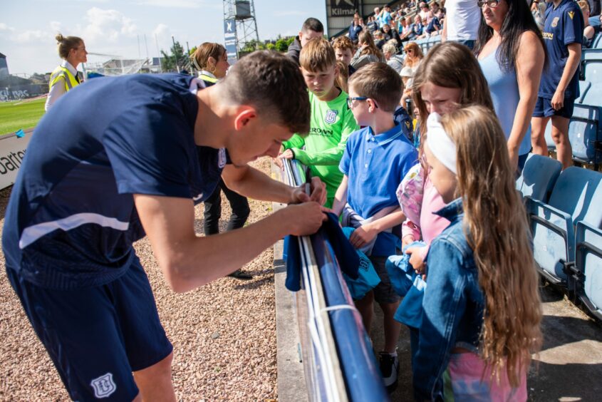 Young fans got to meet the players. Here Owen Beck signs autographs. Image: Kim Cessford/DCT