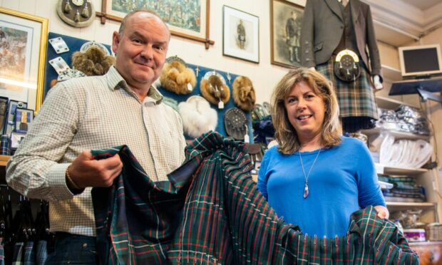 Robert and Jennifer Brown with a kilt they are making. Image: Kim Cessford/DC Thomson.