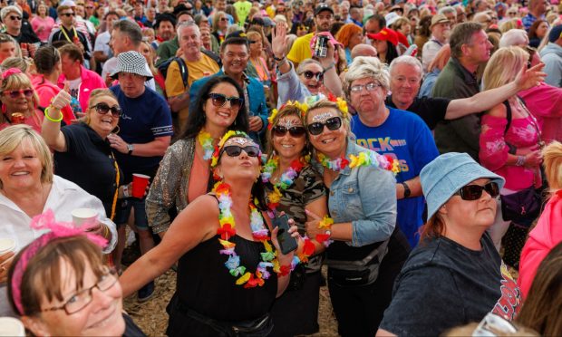 Revellers and 80s music fans descend on the grounds of Scone Palace for day 2 of the annual 80s themed Rewind Festival in July 2023.