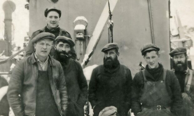 Maintenance crew aboard a whale catcher ship.