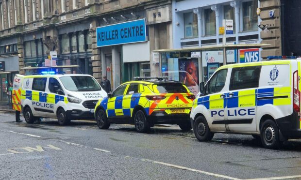 Police Vehicles on commercial street after Dundee High Street incident