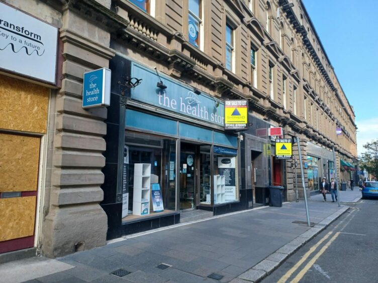 The Health Store and other empty shops on Commercial Street in Dundee