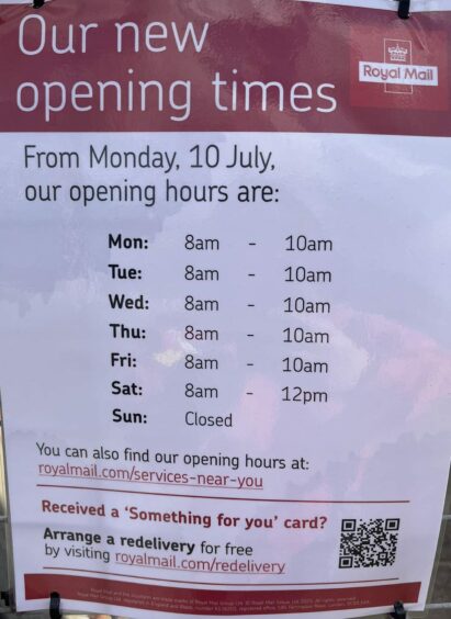 A sign showing Royal Mail delivery office opening times in Dundee