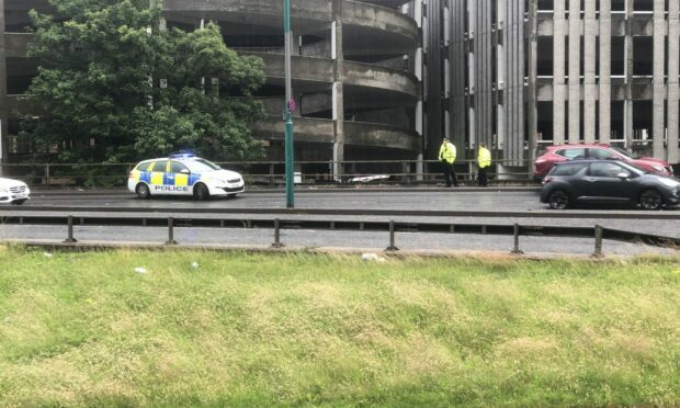 Police at North Marketgait, Dundee. Image: James Simpson/DC Thomson