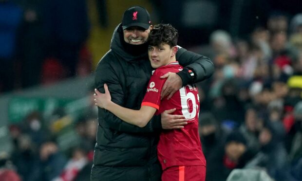 Liverpool boss Jurgen Klopp with Owen Beck.