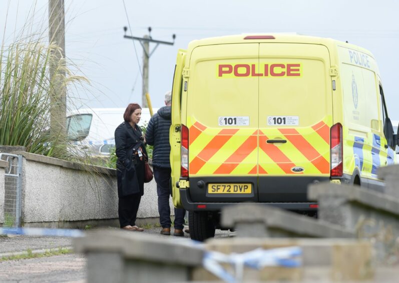 Detectives at Robertson Crescent, Keiss.