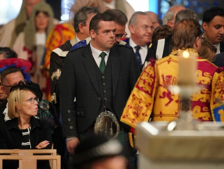 Kilted Scottish Conservative leader Douglas Ross entering St Giles Cathedral, Edinburgh for the Service of Thanksgiving for King Charles III.