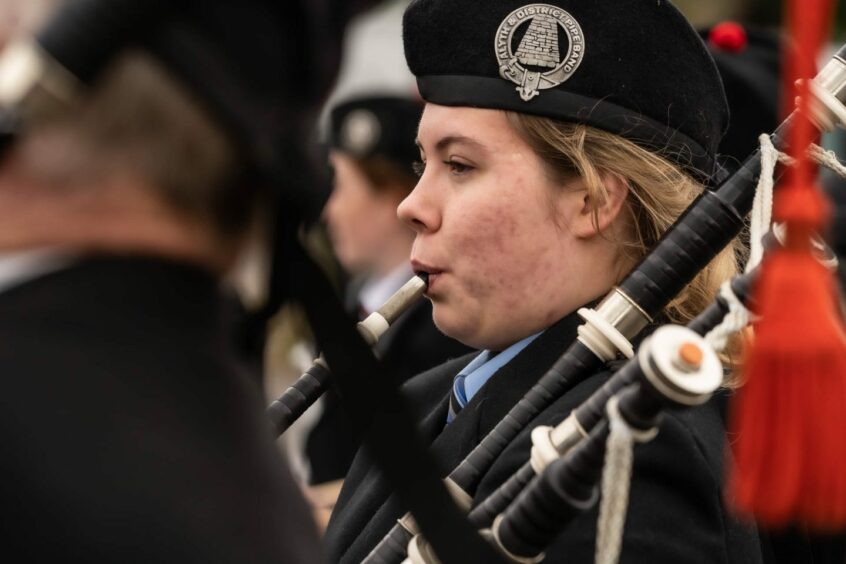 Female bagpiper at the Salute in Perth.