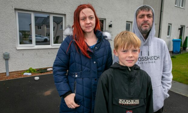 Natasha Thomson with partner Marc Smith and son Kyle Thomson outside their Guardbridge home