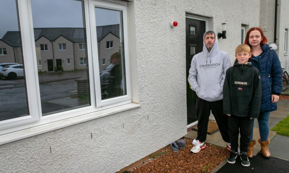 Natasha Thomson with partner Marc Smith and son Kyle Thomson outside their Guardbridge home