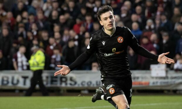 Dylan Levitt wheels away after finding the net against Hearts for Dundee United