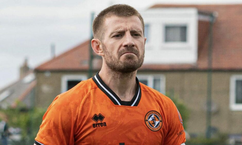 Ross Docherty, Dundee United captain, leaves the field after defeat against Spartans