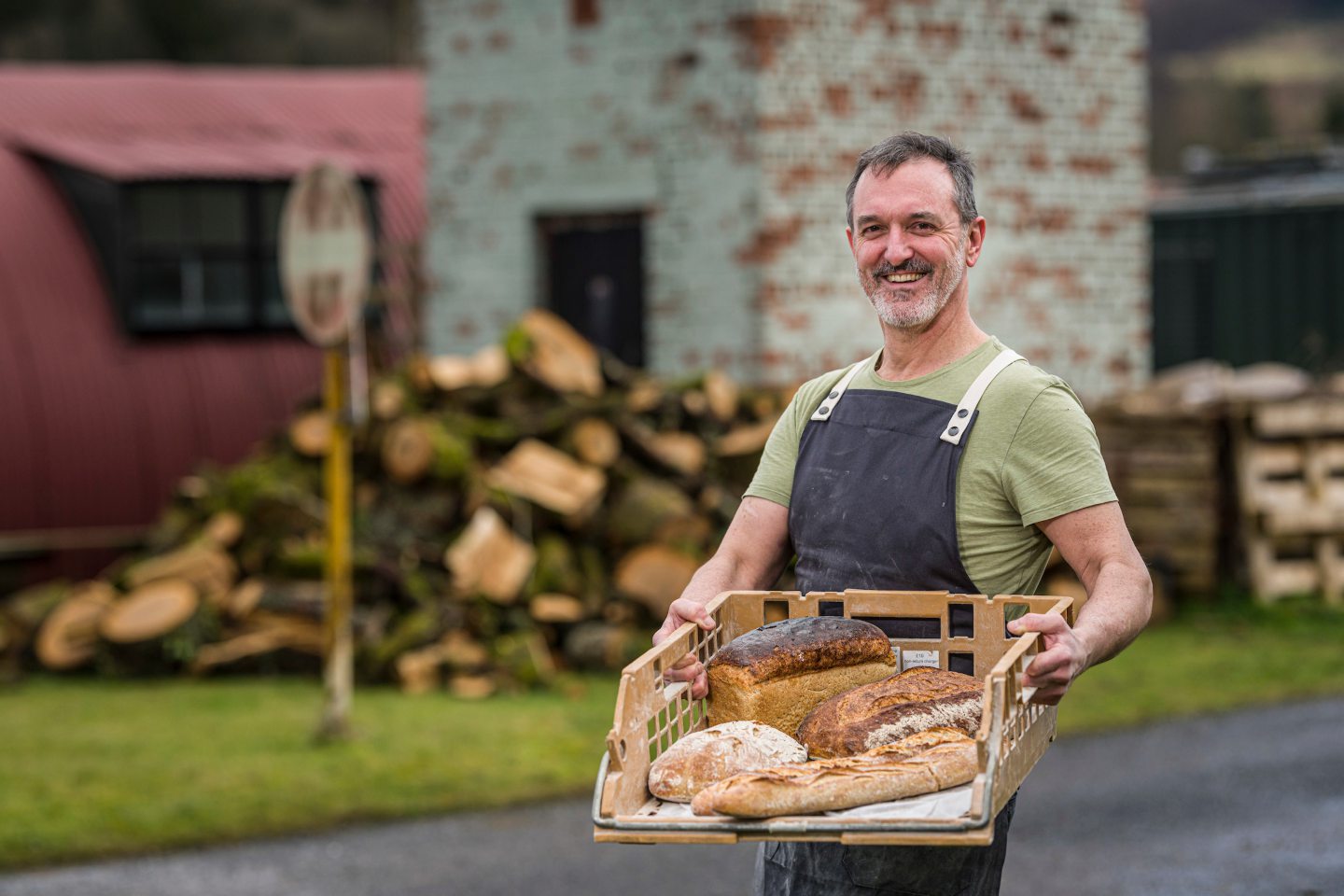 John Castley, owner of Comrie's Wild Hearth Bakery, with some of the company's baking products. 