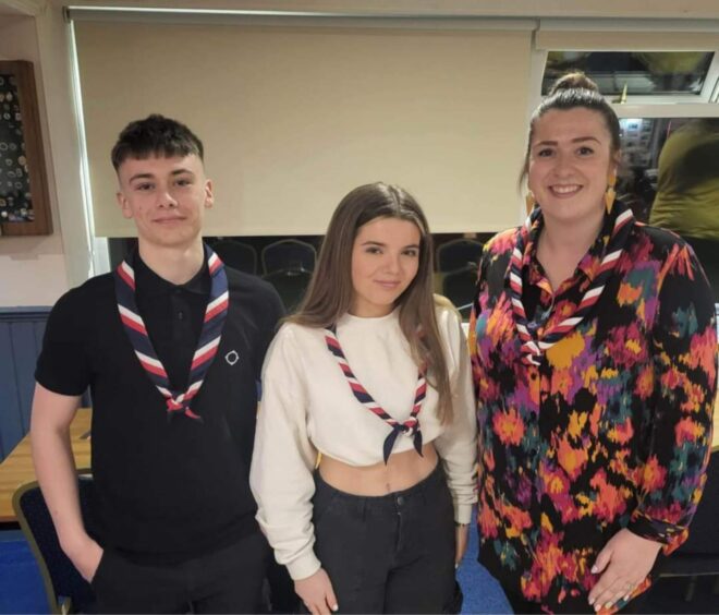 Dundee Explorers Cadeyrn Harris and Lilly Hosie with unit leader Stacey McPherson-Kennedy.