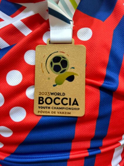 Tyler McLelland's boccia gold medal.