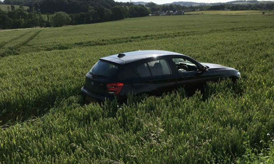 BMW crash in a field near Duntrune.