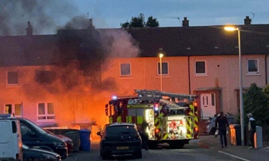 A fire engine at a van fire in Kennoway