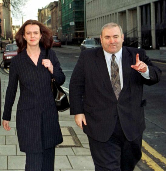 Mr Boyle with client Lucille Ferrie outside Dundee Sheriff Court in the 1990s.