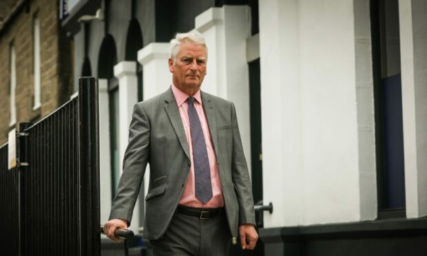 Councillor Craig Duncan outside the RBS branch in Broughty Ferry. Image: Mhairi Edwards/DC Thomson