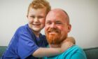 Proud dad Greg Stewart with his son Sandy who is battling a brain tumour. Image: Mhairi Edwards/DC Thomso