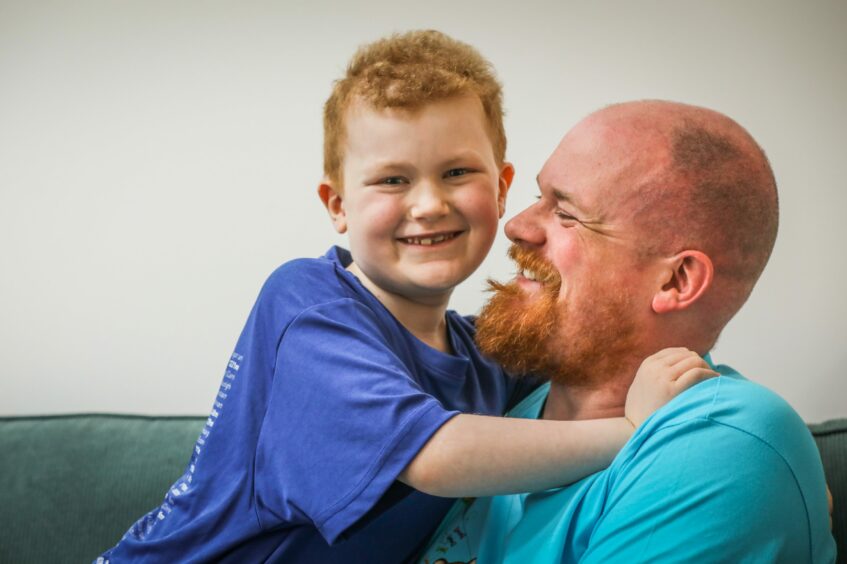 Greg has signed up for next month's Dundee Kiltwalk because of his son Sandy.