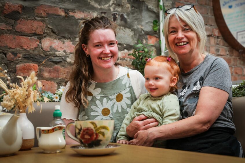 Owner Zoe and manager and mum Jane with two-year-old Lily inside the Broughty Ferry business.