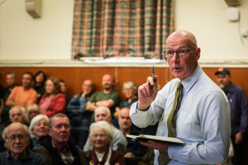 John Swinney addresses crowd at Aberfeldy Town Hall.