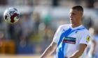 New St Johnstone defender Sam McClelland in action for Barrow.