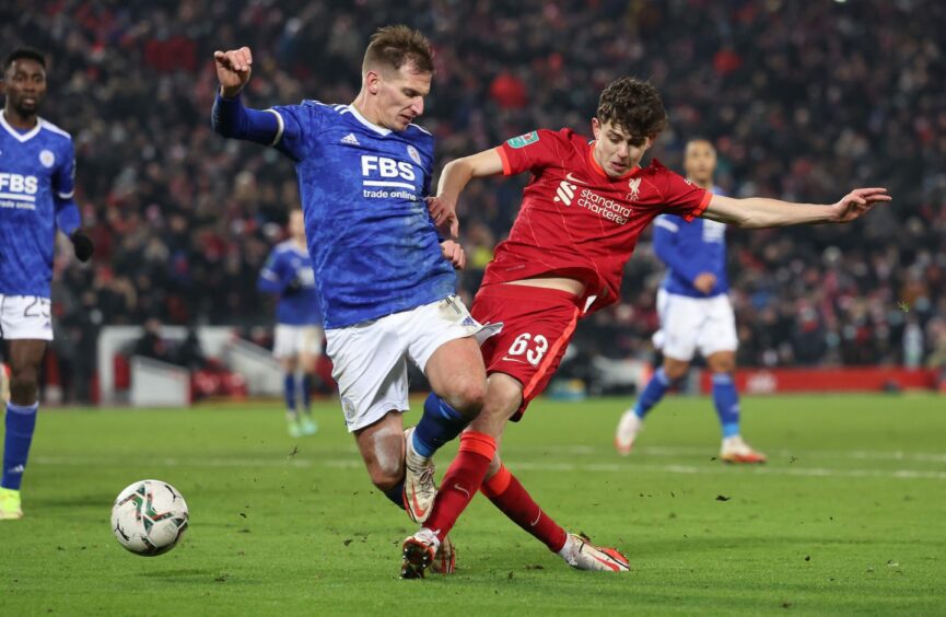 Owen Beck takes on Leicester City.